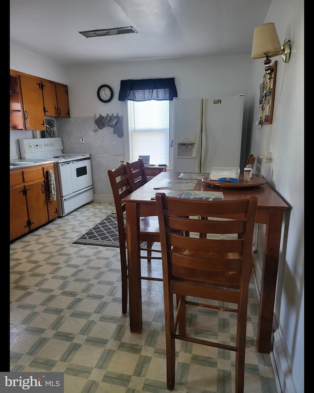 dining room with light floors