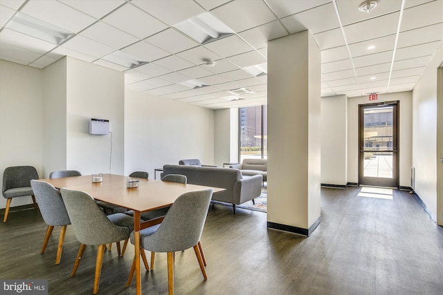 400 Madison St Unit 1704, Alexandria, VA 22314 - dining space featuring wood finished floors, a paneled ceiling, recessed lighting, and baseboards