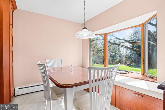 dining space featuring baseboard heating