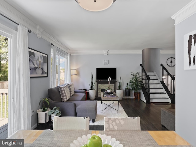 12209 Gable Ln, Fort Washington, MD 20744 - living room featuring wood finished floors, stairs, and ornamental molding