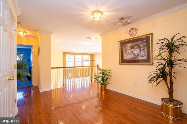 5 Susannah Dr, Chesterfield, NJ 08515 - corridor with wood-type flooring, track lighting, crown molding, and baseboards