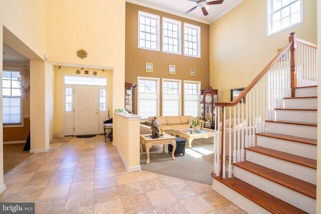 5 Susannah Dr, Chesterfield, NJ 08515 - entryway featuring baseboards, crown molding, stairway, and ceiling fan