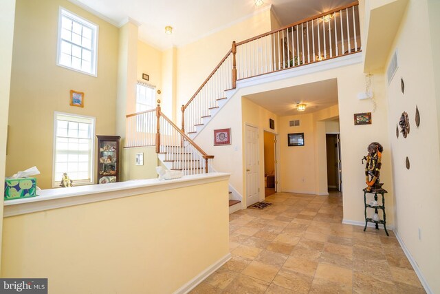5 Susannah Dr, Chesterfield, NJ 08515 - foyer with crown molding, stairway, baseboards, a high ceiling, and visible vents