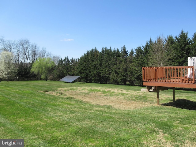 view of yard with a deck
