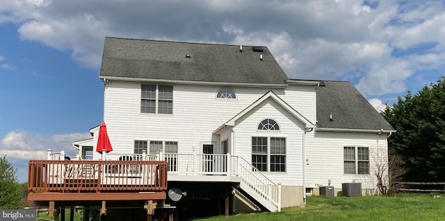 back of house featuring stairs, a deck, central AC, and a shingled roof