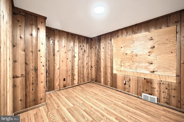 14 Longview Rd, Seven Valleys, PA 17360 - unfurnished room featuring wood walls, visible vents, and wood finished floors