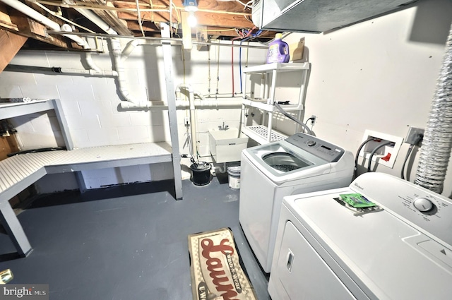 14 Longview Rd, Seven Valleys, PA 17360 - washroom with separate washer and dryer, laundry area, and concrete block wall