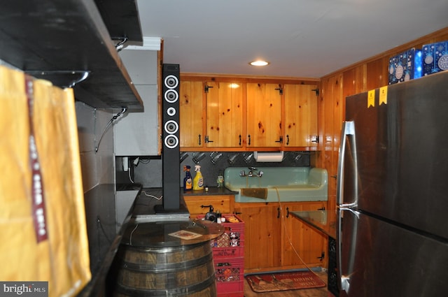 14 Longview Rd, Seven Valleys, PA 17360 - kitchen featuring freestanding refrigerator, recessed lighting, brown cabinets, and a sink