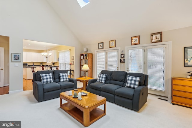 7906 Plum Creek Dr, Gaithersburg, MD 20879 - living area featuring a chandelier, light carpet, and high vaulted ceiling