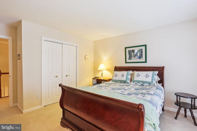 7906 Plum Creek Dr, Gaithersburg, MD 20879 - bedroom with light colored carpet, baseboards, and a closet
