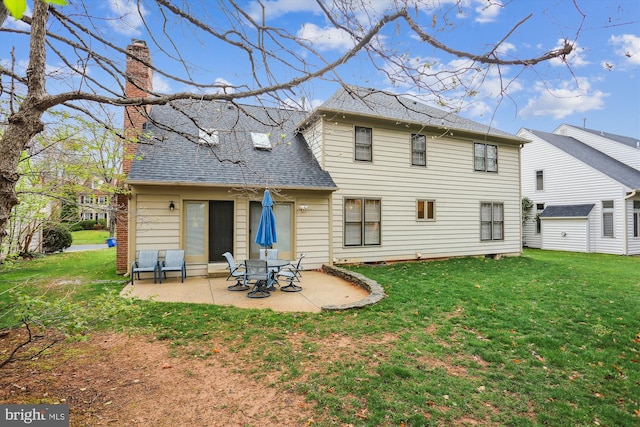 7906 Plum Creek Dr, Gaithersburg, MD 20879 - rear view of property with a patio area, a chimney, a lawn, and a shingled roof