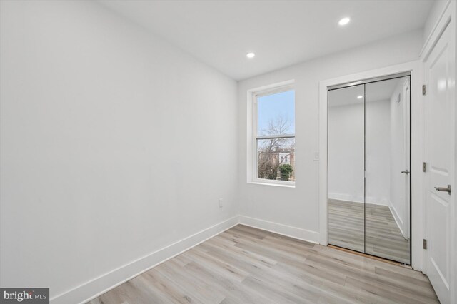 2811 C St, Philadelphia, PA 19134 - unfurnished bedroom featuring a closet, baseboards, recessed lighting, and light wood-style floors