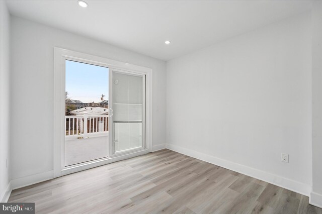 2811 C St, Philadelphia, PA 19134 - empty room featuring wood finished floors, baseboards, and recessed lighting