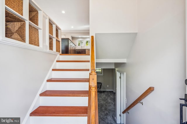 staircase with recessed lighting, carpet flooring, and baseboards