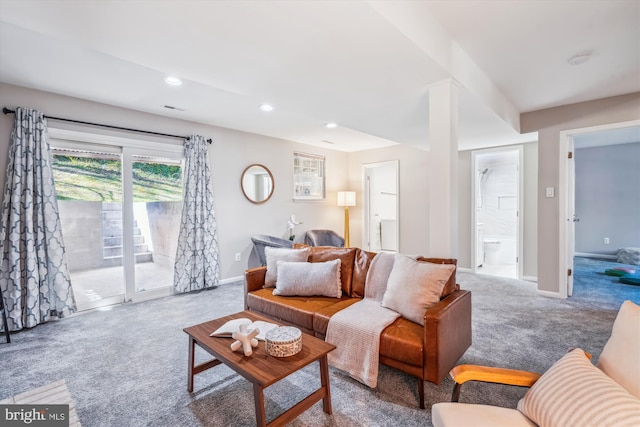living area with recessed lighting, carpet flooring, visible vents, and baseboards