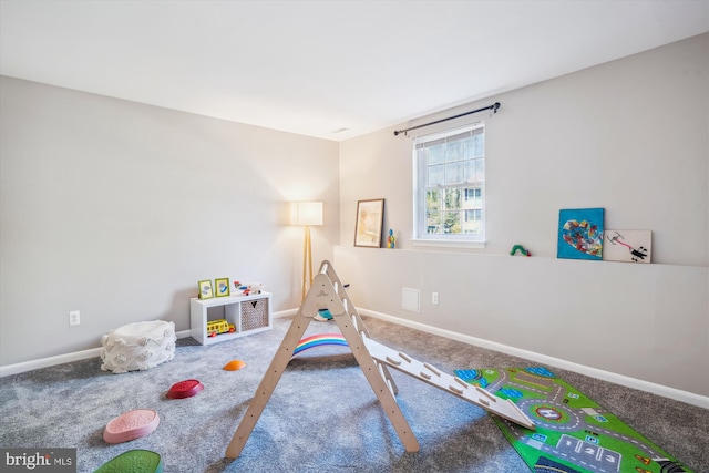 recreation room featuring baseboards