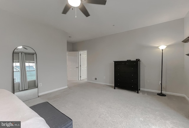 unfurnished bedroom with light carpet, baseboards, and visible vents