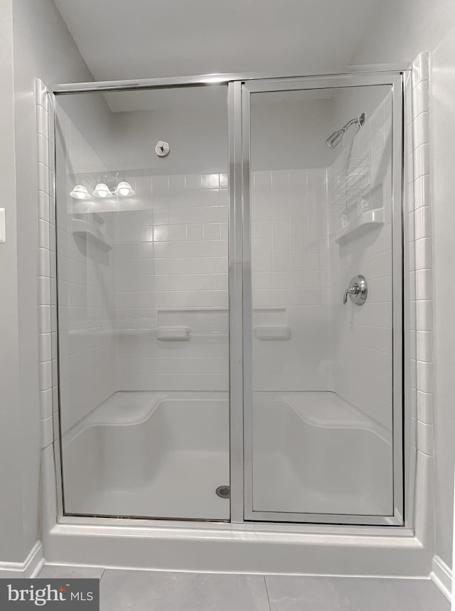 full bathroom with a stall shower
