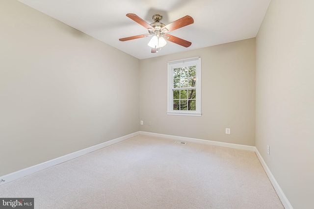 3568 S George Mason Dr Unit 12, Alexandria, VA 22302 - unfurnished room with light colored carpet, ceiling fan, visible vents, and baseboards