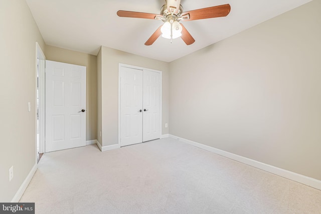 3568 S George Mason Dr Unit 12, Alexandria, VA 22302 - unfurnished bedroom featuring carpet, a closet, a ceiling fan, and baseboards