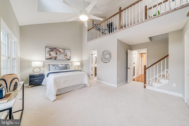 3568 S George Mason Dr Unit 12, Alexandria, VA 22302 - carpeted bedroom featuring baseboards, a towering ceiling, and ceiling fan