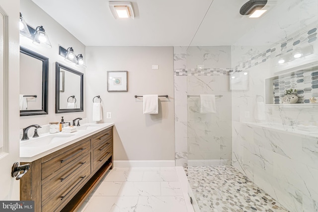 3568 S George Mason Dr Unit 12, Alexandria, VA 22302 - bathroom featuring baseboards, marble finish floor, a sink, and a marble finish shower