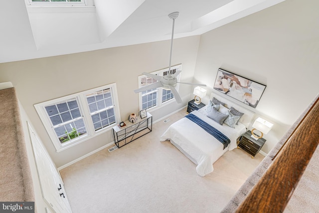 3568 S George Mason Dr Unit 12, Alexandria, VA 22302 - bedroom with high vaulted ceiling, carpet floors, visible vents, and baseboards