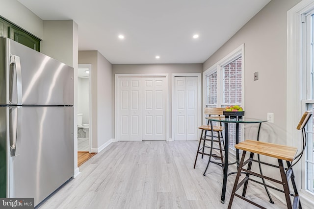3568 S George Mason Dr Unit 12, Alexandria, VA 22302 - dining room with baseboards, recessed lighting, and light wood-style floors