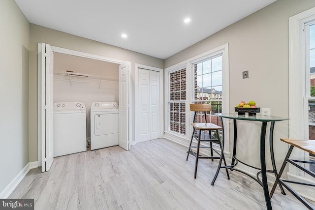 3568 S George Mason Dr Unit 12, Alexandria, VA 22302 - clothes washing area featuring recessed lighting, laundry area, light wood-type flooring, baseboards, and separate washer and dryer