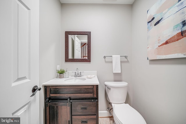 3568 S George Mason Dr Unit 12, Alexandria, VA 22302 - half bath featuring toilet, vanity, and baseboards
