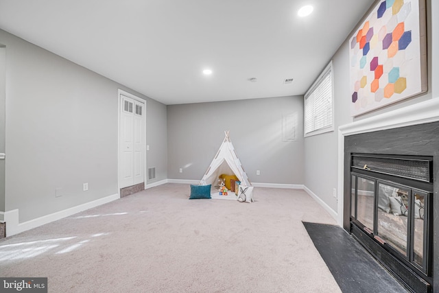 3568 S George Mason Dr Unit 12, Alexandria, VA 22302 - game room with a fireplace with flush hearth, carpet floors, baseboards, visible vents, and recessed lighting
