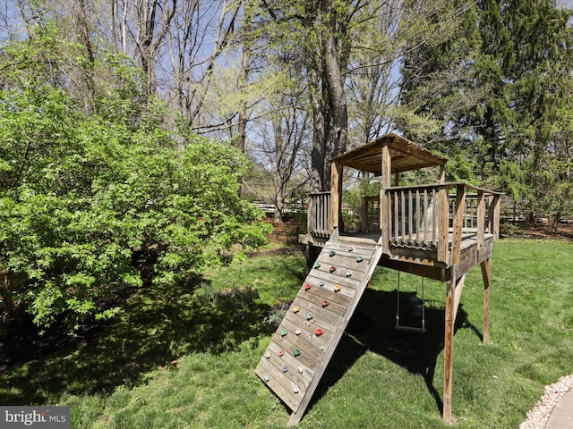view of play area featuring a yard