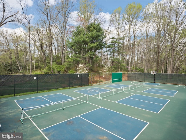 view of sport court with fence and community basketball court