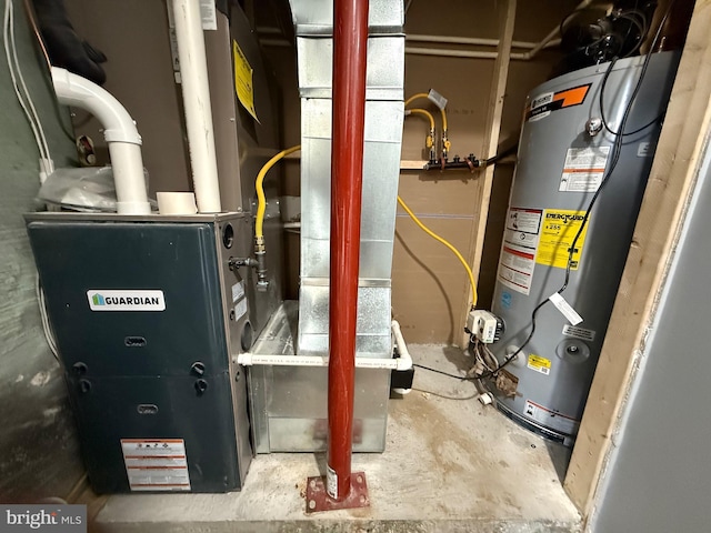 utility room featuring heating unit and gas water heater