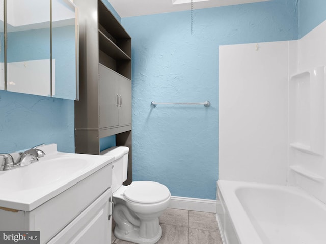 full bathroom featuring tile patterned flooring, a textured wall, toilet, vanity, and baseboards