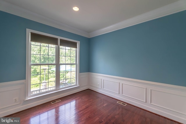 9184 Laurel Highlands Pl, Manassas, VA 20112 - empty room featuring wainscoting, ornamental molding, dark wood-style floors, and recessed lighting