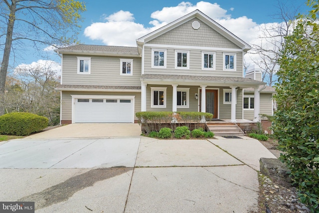 264 Capote Ct E, Severna Park, MD 21146 - view of front facade featuring a porch, driveway, and an attached garage