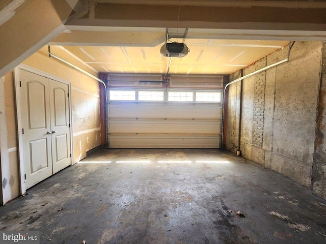 garage featuring a garage door opener