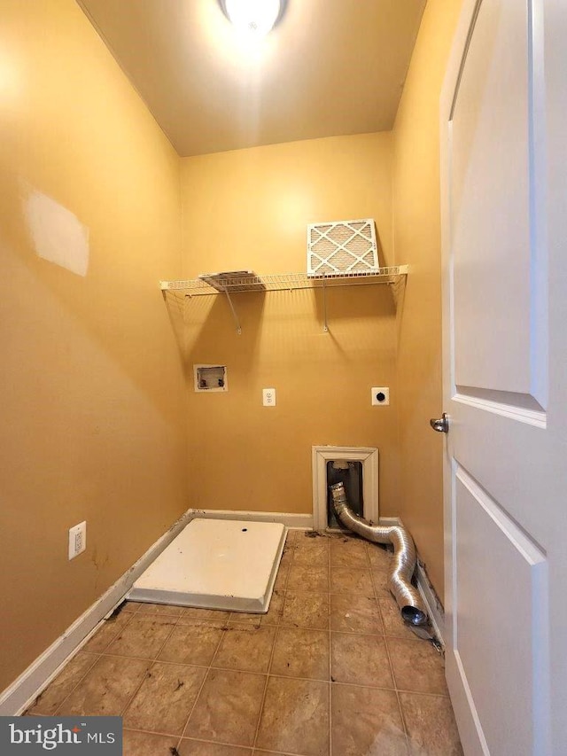 washroom featuring tile patterned flooring, baseboards, electric dryer hookup, laundry area, and washer hookup