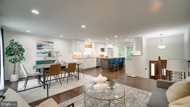 1601 Jubilation Ct, Herndon, VA 20170 - living room with dark wood-style flooring and recessed lighting