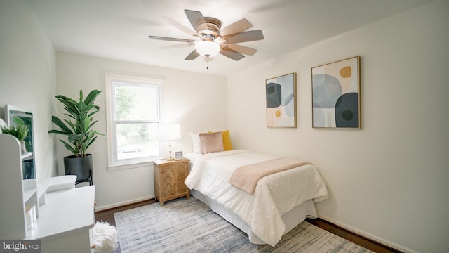 1601 Jubilation Ct, Herndon, VA 20170 - bedroom featuring wood finished floors, baseboards, and ceiling fan