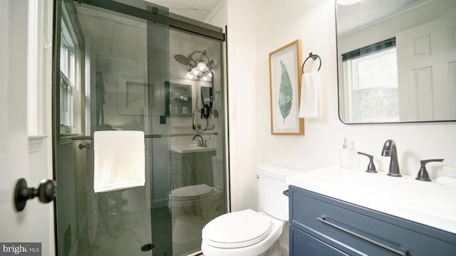 1601 Jubilation Ct, Herndon, VA 20170 - bathroom with toilet, a shower stall, and vanity