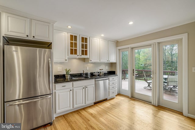 6515 Walters Woods Dr, Falls Church, VA 22044 - kitchen featuring appliances with stainless steel finishes, white cabinetry, and a sink