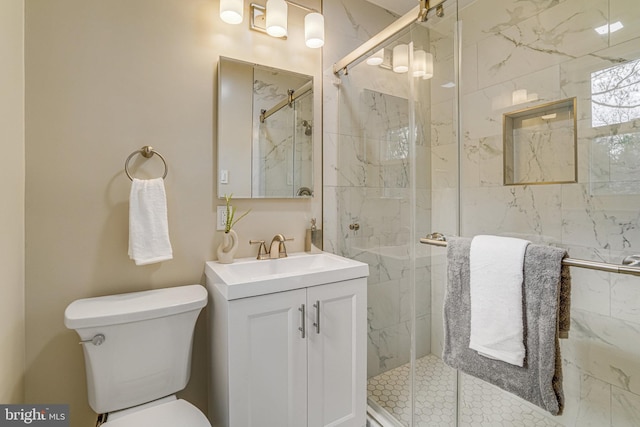 6515 Walters Woods Dr, Falls Church, VA 22044 - full bath with a marble finish shower, vanity, and toilet