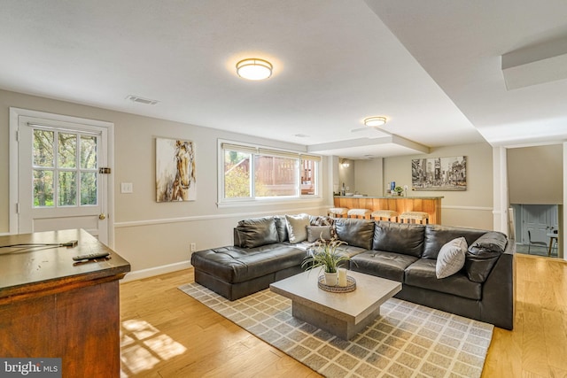 6515 Walters Woods Dr, Falls Church, VA 22044 - living room featuring plenty of natural light, visible vents, light wood finished floors, and baseboards