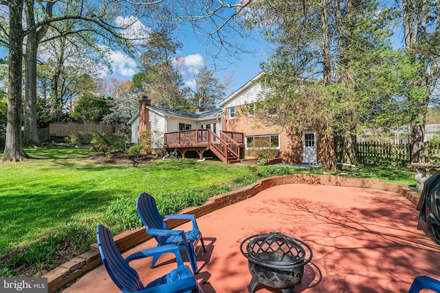 6515 Walters Woods Dr, Falls Church, VA 22044 - view of patio with a fire pit, a fenced backyard, stairway, and a deck