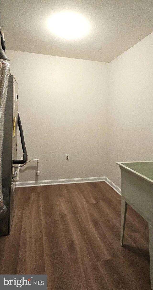 spacious closet with wood finished floors