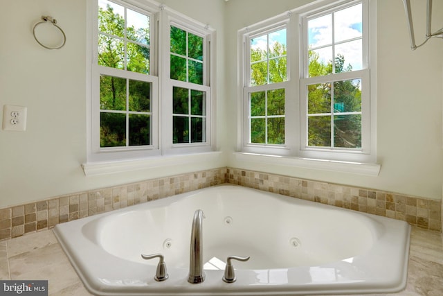 bathroom featuring a jetted tub