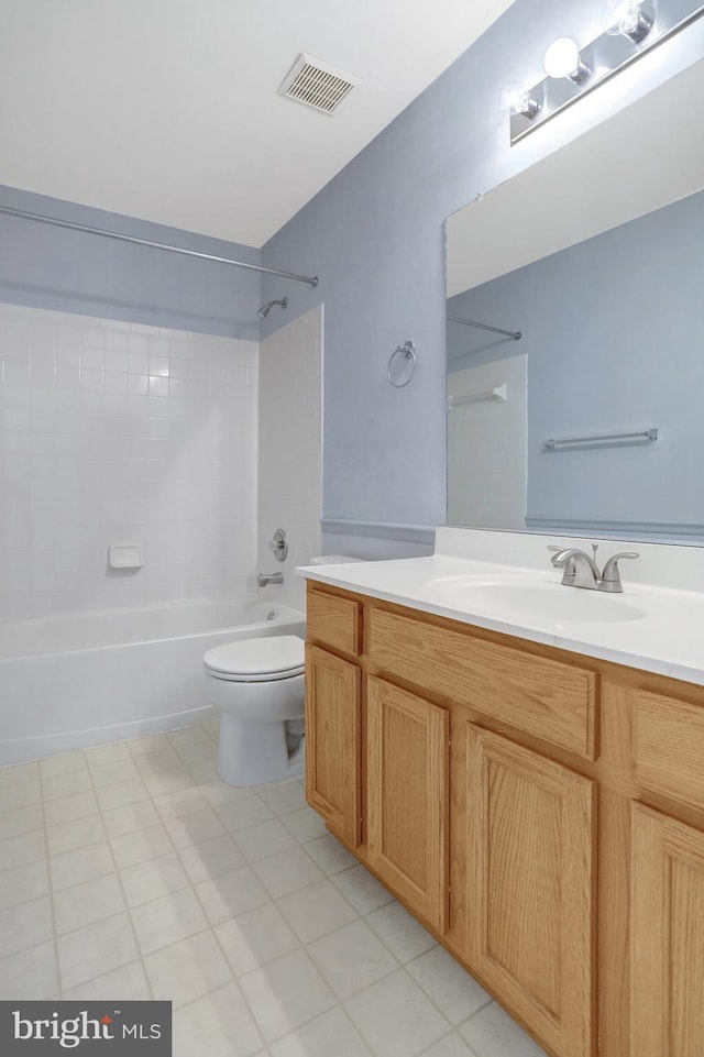 bathroom featuring toilet, bathing tub / shower combination, vanity, and visible vents