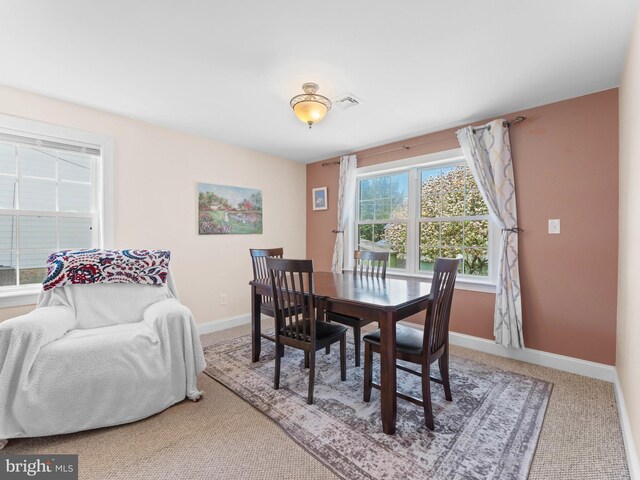 600 Maplewood Rd, Springfield, PA 19064 - carpeted dining area with baseboards and visible vents